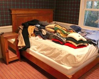 Wood Bed with Small Mirror Fronted Wood Cabinet with Clothing