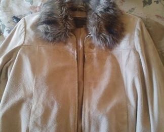 Faux Fur jacket with genuine leather.