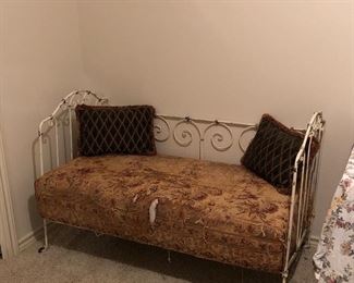 Antique iron baby bed made into a settee/bench