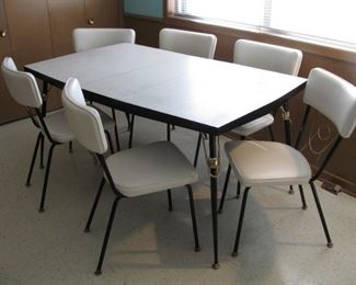 Retro Table and White Leather Chairs