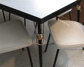 Retro Table and White Leather Chairs