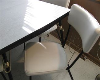 Retro Table and White Leather Chairs