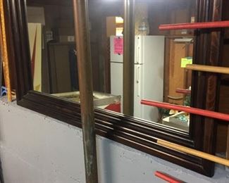 huge wood-framed mirror