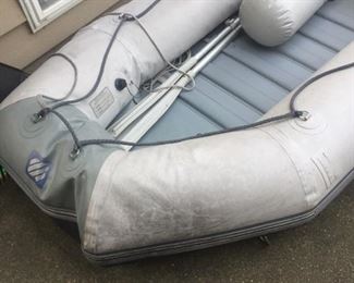 hard inflatable tender with oars---nice condition with rigid bottom