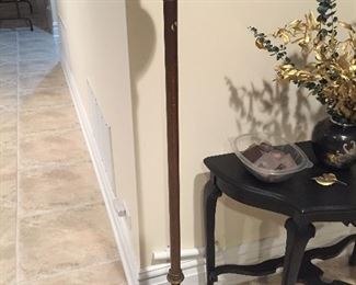 A floor lamp with marble base