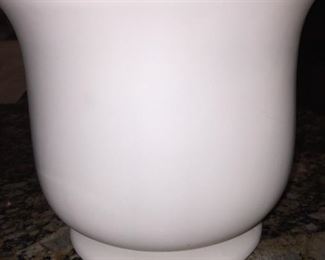 A white ceramic flower pot