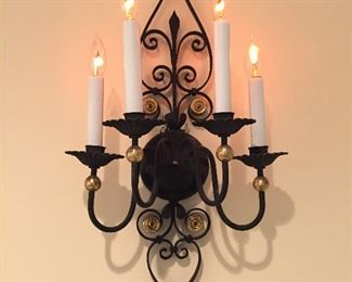 A 4-light wall sconce