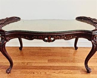 Side table with wood carving, glass top