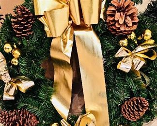A Christmas Wreath with Gold Bows