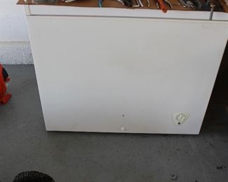 Freezer with drain plug