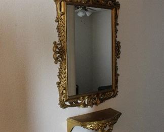 gold mirror and shelf