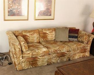 two matching designer couches