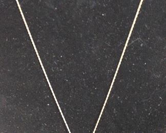 Gold chain necklace with stone