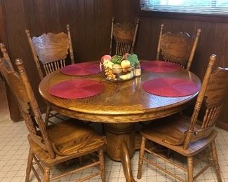 Oak reproduction claw foot table and 6 chairs - plus leaf!!