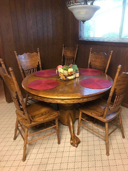 Oak reproduction claw foot table and 6 chairs - plus leaf!!