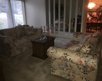 another view of the love seats and occasional table