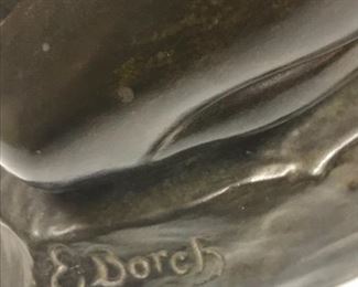 E Borch signature on the bronze boy holding a teddy bear