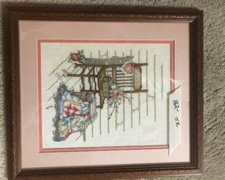 one of several cross stitched pieces