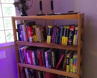 Antique lamps with milk glass shades, antique cool fan and shelves full of curious things about to go extinct so grab them up while you can