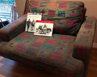 comfy armchair is very proud of its tattoos