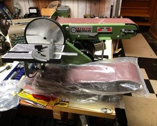 That looks like a sanding belt and meat slicer