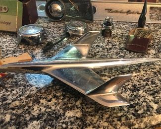 Hood ornament to a 1954 Ford