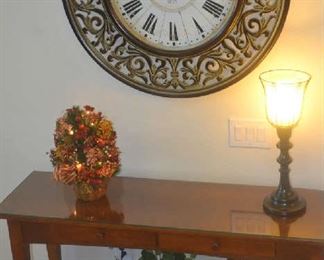 sofa table, large decorative wall clock, decor