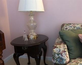 One of two solid wood side table, crystal lamp, Waterford bell, Mikasa bell