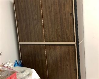 Nice vintage metal cabinet has sliding doors