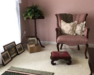 Curved back upholster chair, footstool, wooden music stand.