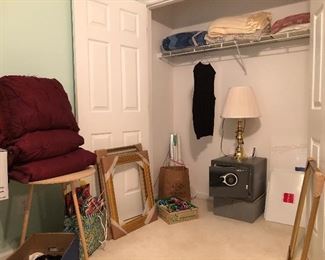 Three large, gold frames, bows and Christmas bags, Sentry safe, brass lamp, afghan, blankets and more