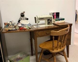 Kenmore sewing machine, books (newer Gone with the Wind) handmade doll , sewing box.