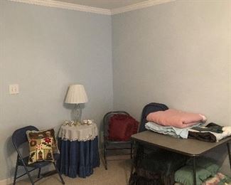 Card table with linens, wedding ring quilt(under card table)
