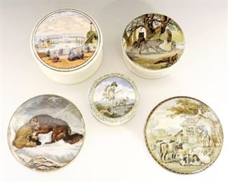 Five 19th Century Prattware Covered Pots.  English pottery transfer-decorated boxes with polychrome scenes including "The Snow Drift", "Royal Harbour Ramsgate", and three untitled including one that features two bears on the cover.  Crazing and some wear and light surface scratches to each, one with some discoloration, "The Snow Drift" with a small loss at the underside.  Up to 4" diameter x 2 1/4" high.  