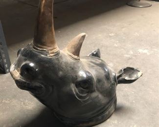 This rhinos head needs a little touch-up work, but it is an awesome ornament for your wall.