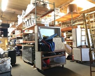 A warehouse full of everything from end tables to garden furniture.