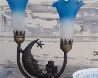 Eclectic brass light with moon, angel and blue tulip glass bells.