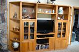 This entertainment center is large but is in five pieces butted up together.