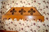 The Catholic style table comes with an over-hanging light with stained glass elements settled into the wood.