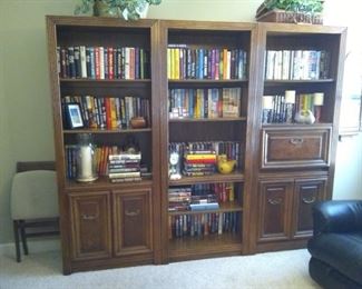 3 matching wood bookcases