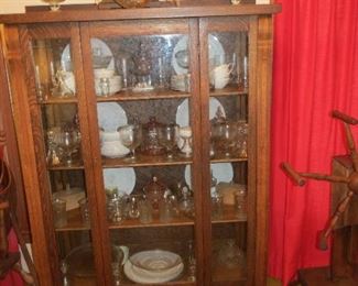 COMMANDING ANTIQUE OAK CHINA CABINET.