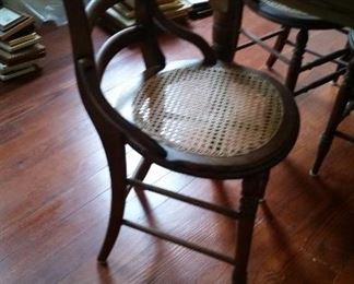 4 cane chairs table