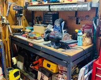 Tons and tons of tools, workbenches and more 