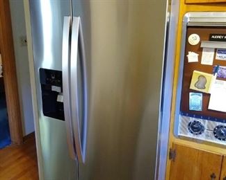 NEW....Just installed Whirlpool Side by Side Refrigerator / Freezer.  Owner moved.  Never used. Retails for $1250.