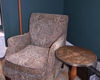 One of three matching upholstered arm chairs