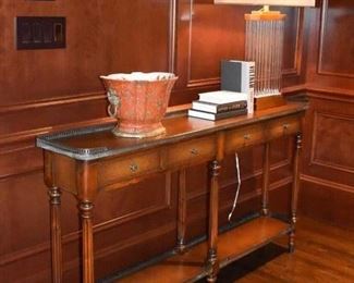 Theodore Alexander console table with leather drawer fronts