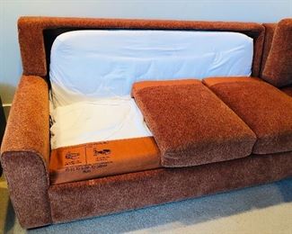 Special bonus: left end of sectional includes a queen size pull-out bed! 