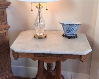 Antique marble top Eastlake table, crystal & brass lamp (likely Waterford)