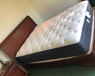 Queen size sleigh bed by Shermag (87”L, 63”W, 45”H)  Mattress is not for sale