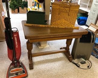 Antique oak table (26” x 40” x 29”H - top flips out & spins to double size!), Eureka upright vacuum, picnic basket, Lasko heater with remote
